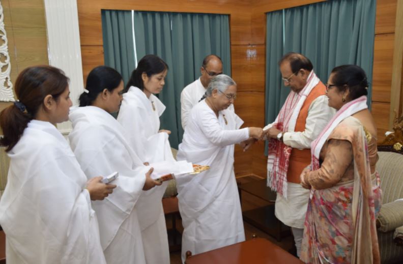 Guwahati - H.E. Hon'ble Governor & Hon'ble Chief Minister of Assam ties Rakhi by Rajyogini BK Sheela